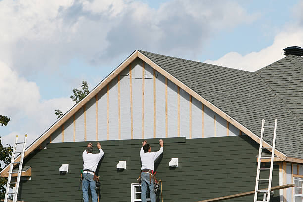 Professional Siding Contractor technician working in Bairdford, PA
